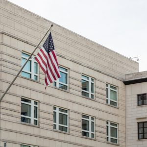 Grey building with American Flag