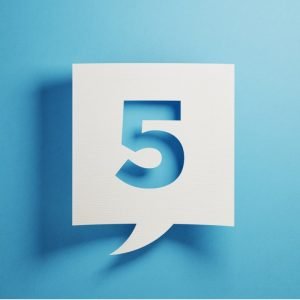 Blue background with white square number five cut-out